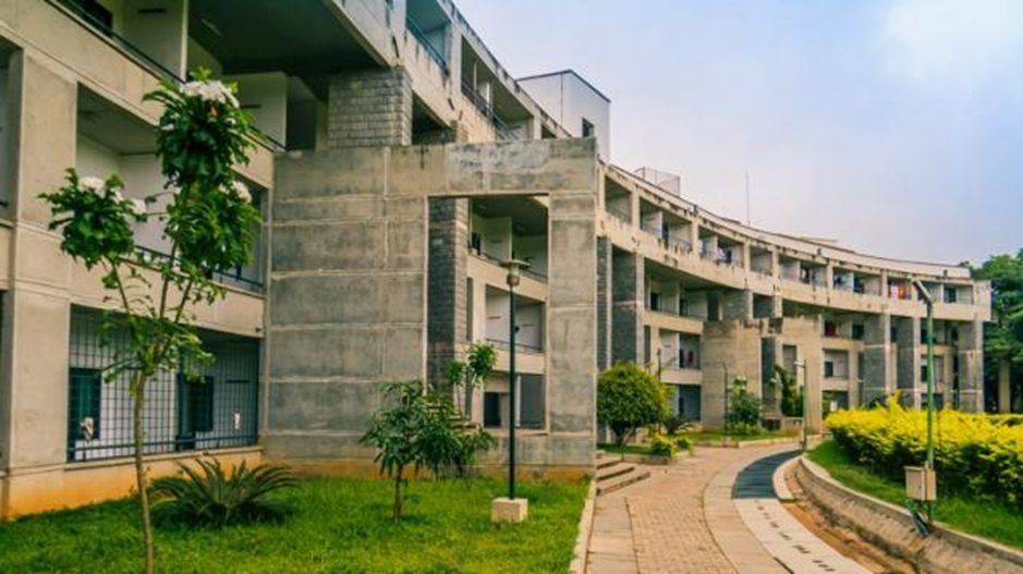 Image of IIM Bangalore campus highlighting its modern infrastructure and learning spaces.